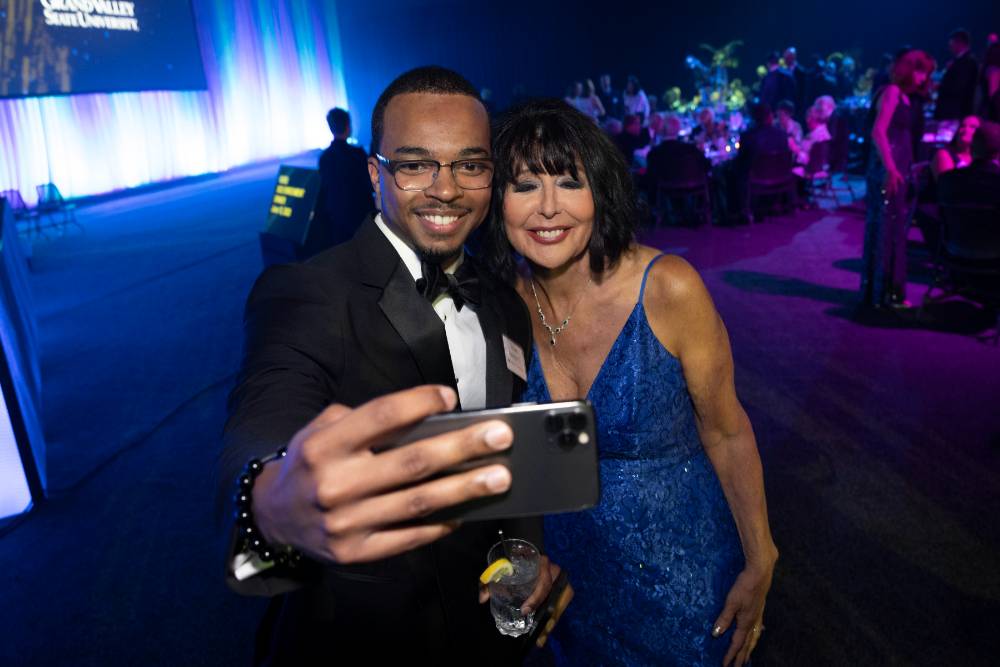 President Mantella taking a selfie with fellow guest